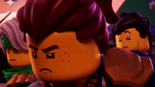 a group of lego characters are standing next to each other and one has a sad look on his face