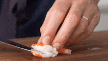Slicing The Shrimp Brian Lagerstrom GIF - Slicing The Shrimp Brian Lagerstrom Cutting The Shrimp Into Pieces GIFs