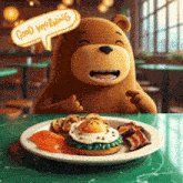 a teddy bear is sitting at a table with a plate of food and a speech bubble saying good morning