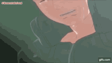a close up of a man crying with tears coming out of his eyes .