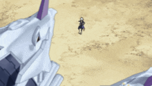 a man is standing in front of a giant robot