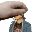 a pixel art of a person 's head being touched by a hand .