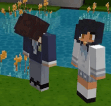 a boy and a girl are standing next to each other in a minecraft game