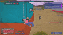 a man in a pink shirt is holding a gun in front of a plane that says vclet