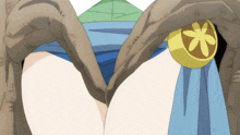 a close up of a person 's legs with a yellow flower on the belt