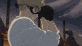 a man with a mask on his face is being punched