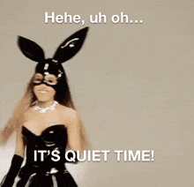 a woman wearing a bunny mask with the words " it 's quiet time " above her