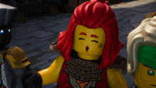 a close up of a lego figure with red hair and a surprised look on her face