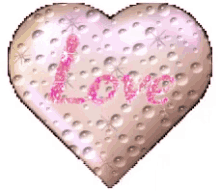 the word love is written on a pink heart