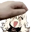 a hand is holding a cartoon character 's head with its tongue out .