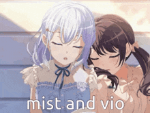 two anime girls are hugging each other with the words mist and vio written in the corner .