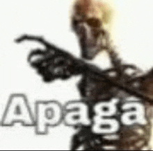 a skeleton is pointing at the camera with the word apaga written on the bottom .