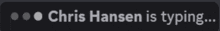 chris hansen is typing on a dark background