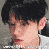 a close up of a person 's face with the words honeys404 honest reaction written on the bottom