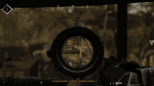a screenshot of a video game shows a sniper aiming at something