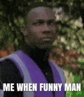 a man is wearing a purple vest and says me when funny man