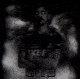 a man in a shirt that says xbe on it