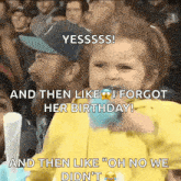 a little girl is holding a cotton candy in her mouth while sitting in a crowd .