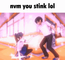 a boy and a girl are dancing in a room with the words `` nvm you stink lol '' .