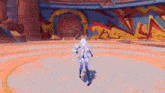 a video game character is spinning in a circle in front of a wall with graffiti .