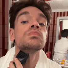 Shaving Robin James GIF - Shaving Robin James Shaving Off GIFs