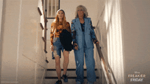 a poster for freakier friday shows two women walking down the stairs together