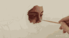 a person is painting a woman 's face with a brush made in animotica
