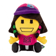 a stuffed toy with a purple hat and a shirt that says tough guys wear pink