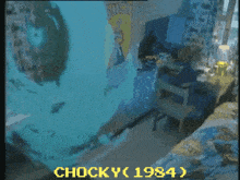 a video of a person standing in a room with the year 1984 on the bottom