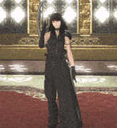 a woman in a black dress is standing in a room