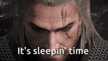 a close up of a man 's face with the words it 's sleepin ' time
