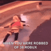 a stuffed animal is laying on the ground with the words when you were robbed of 38 robux
