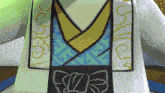 a cartoon character is wearing a white shirt with a blue and yellow geometric pattern