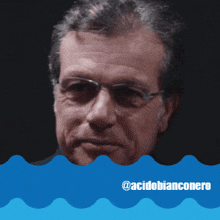 a picture of a man with glasses and the words acidobianconero below