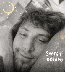 a black and white photo of a man sleeping with the words sweet dreams written on the bottom