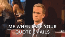 a man in a suit and tie is sitting in a chair with a quote email .