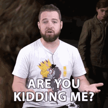 a man with a beard wearing a white shirt that says are you kidding me