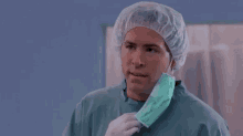 a surgeon wearing a surgical cap and mask is asking but why ?