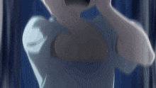 a close up of a person covering their mouth with their hands