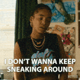 a woman in a daft punk shirt says i don t wanna keep sneaking around