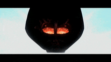 a dark room with a red light coming out of the bottom