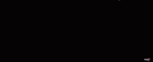 a close up of a wheel with a circle in the middle and a few arrows pointing in different directions