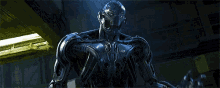 a robot is standing in a dark room with smoke coming out of it