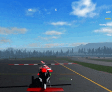 a computer screen shows a plane on a runway with the letters se and s on it