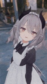 a girl with horns is wearing a maid dress