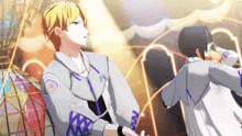 two anime characters are standing next to each other and one has the letter x on his chest