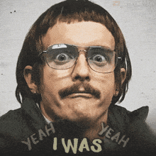 a man wearing glasses says yeah i was