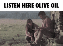 a man and a woman sit in a field with the words listen here olive oil
