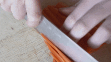 Slicing The Carrot Two Plaid Aprons GIF - Slicing The Carrot Two Plaid Aprons Making Carrot Slices GIFs