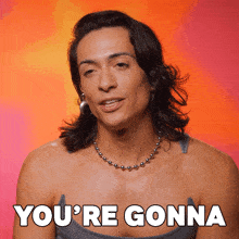 a man with a necklace and earrings says you 're gonna
